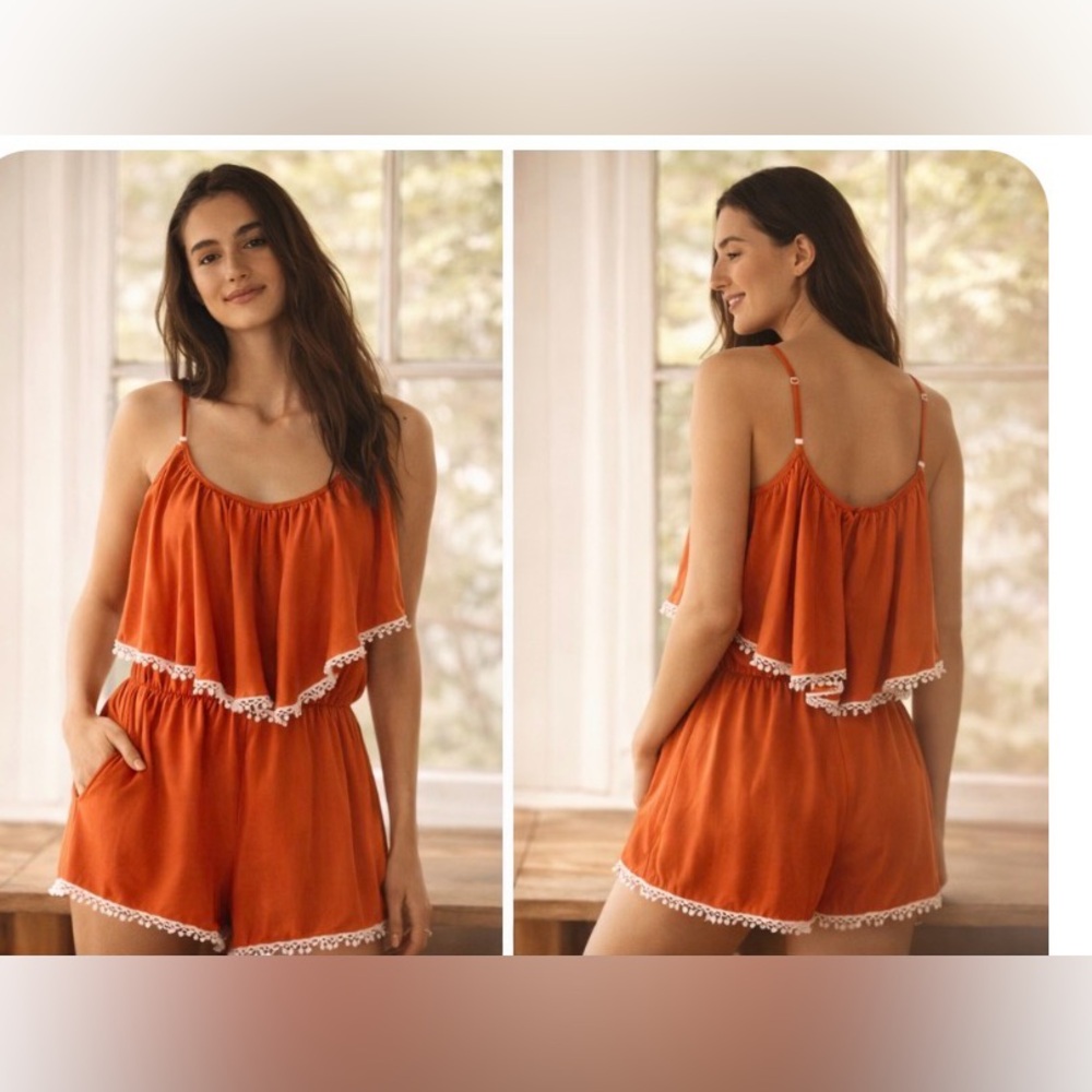 Brunt orange romper with white trim detail